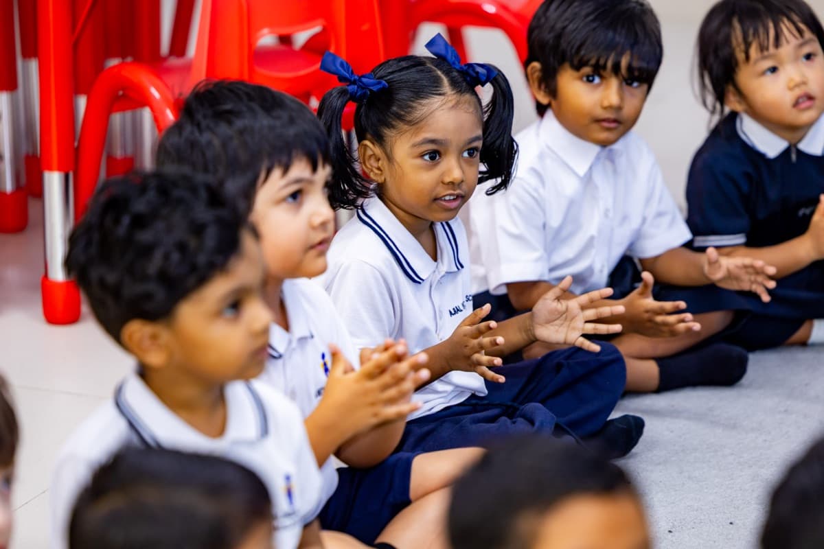 Teacher and children in classroom